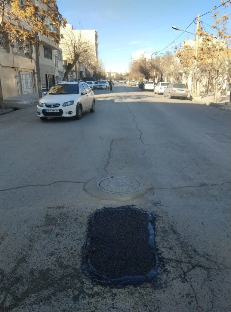 Smoothing traffic flow with asphalt patching and repair of roads