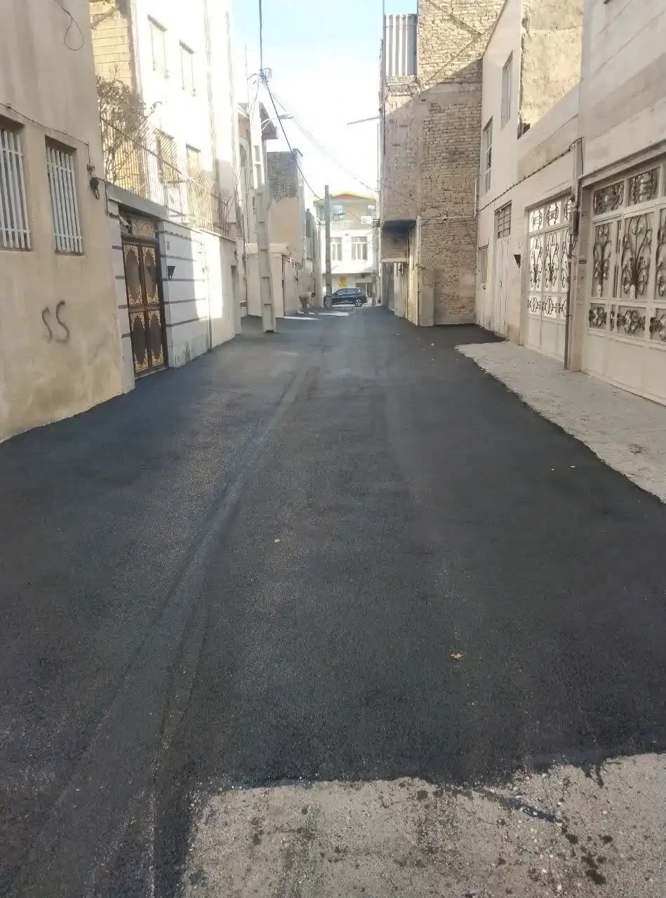 A fresh reflection of splendor; the city’s alleys came to life with new asphalt