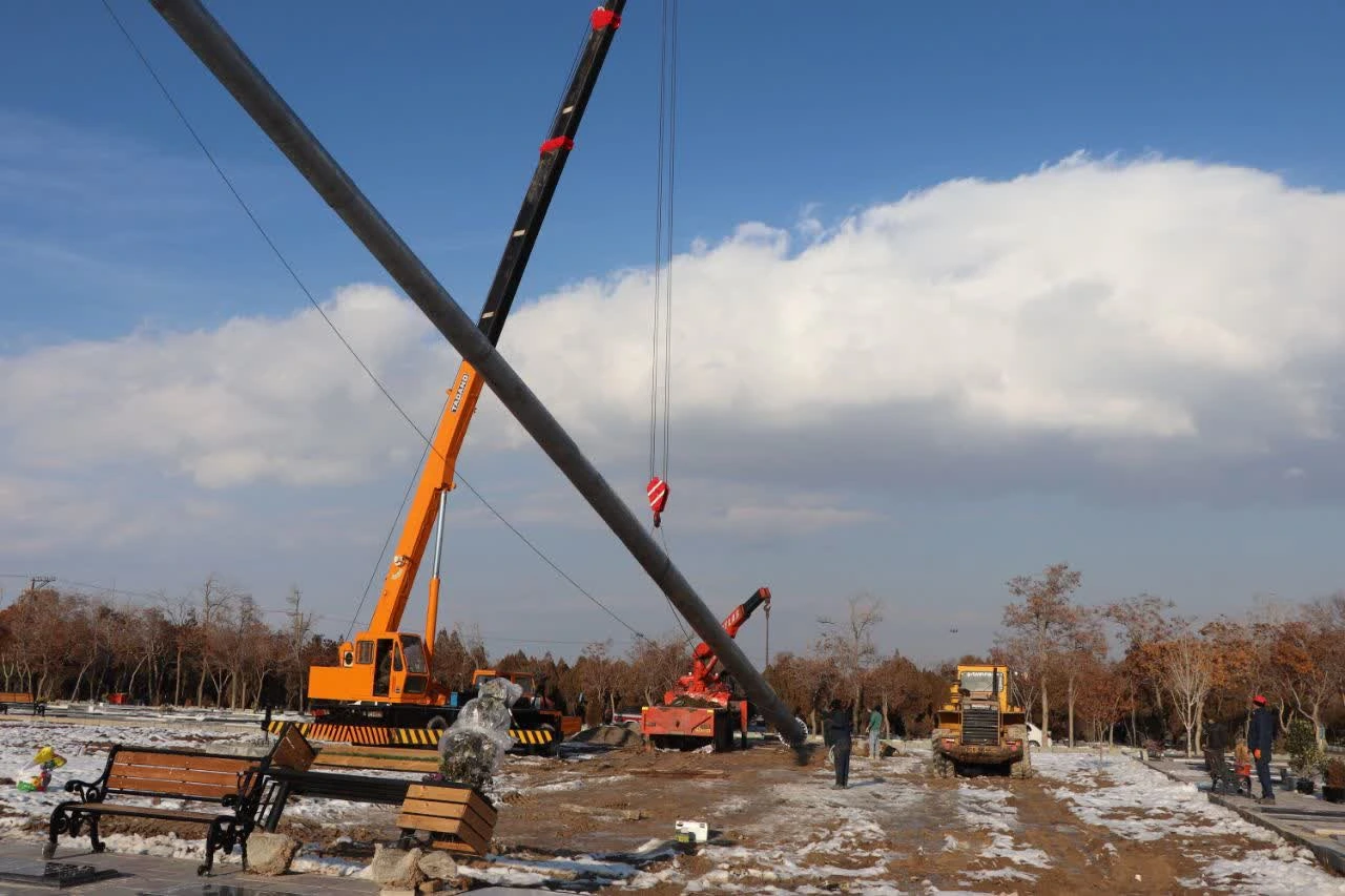 The highest three-colored flag of Iran raised in the Arak cemetery